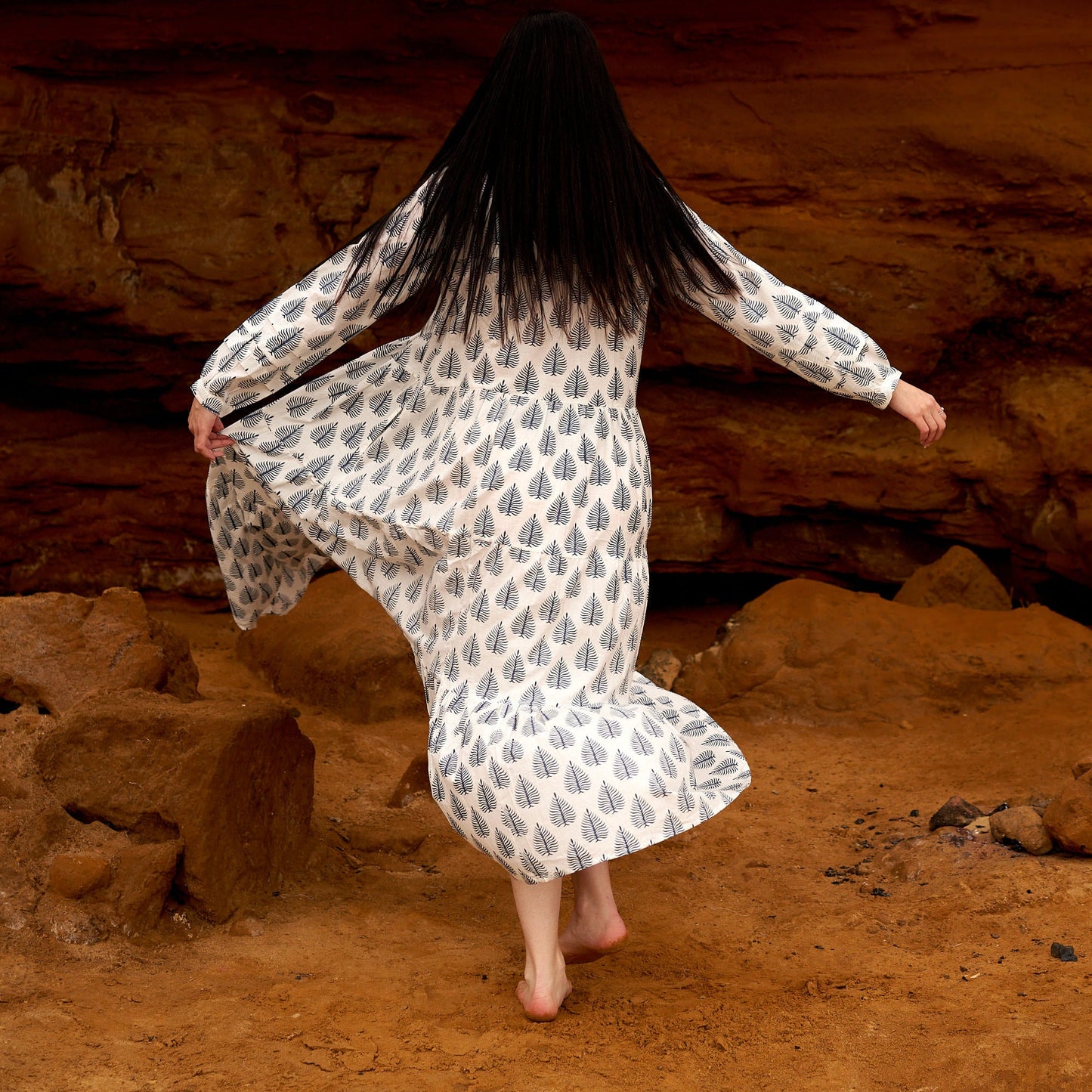 Flowing white cotton maxi dress with boho print