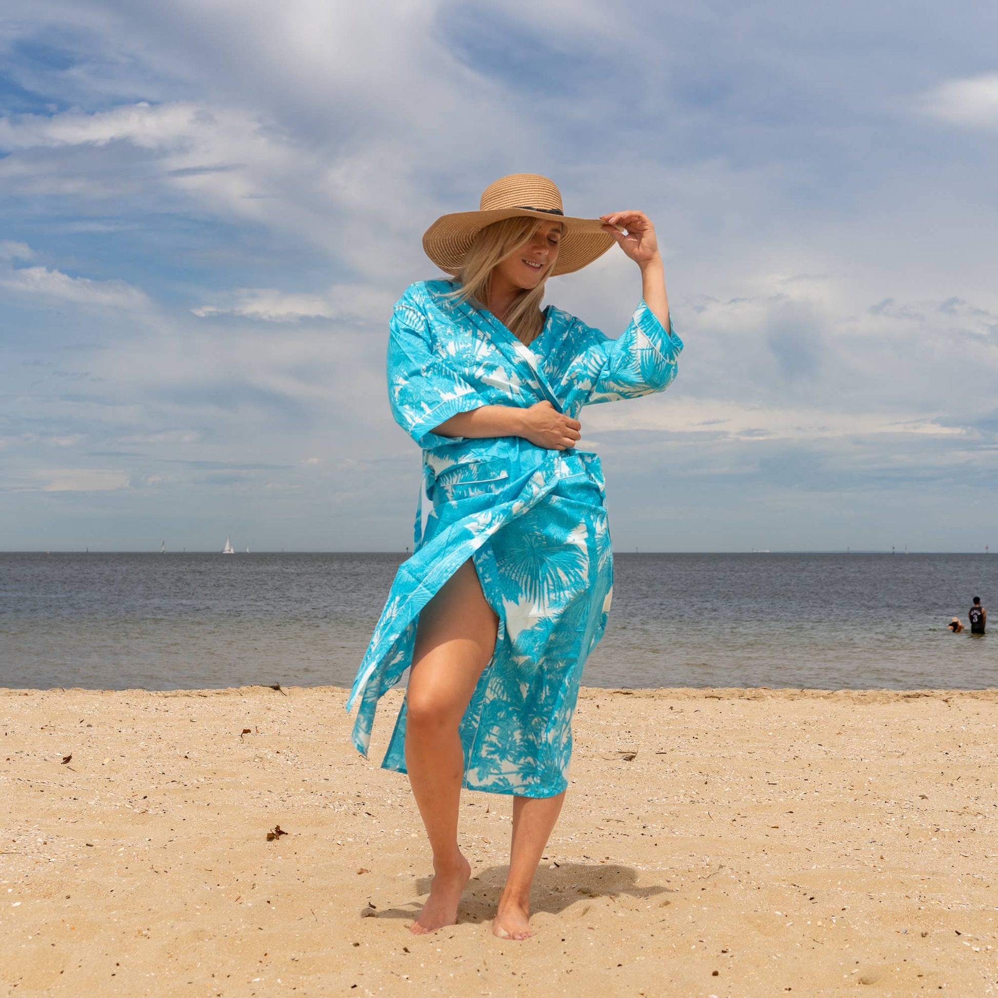 White kimono robe with soft pastel floral patterns
