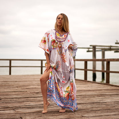 Woman in vibrant silk kaftan
