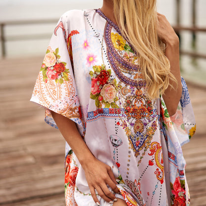Woman in vibrant silk kaftan