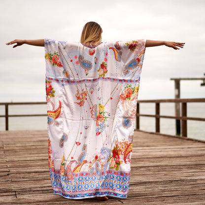 Woman in vibrant silk kaftan