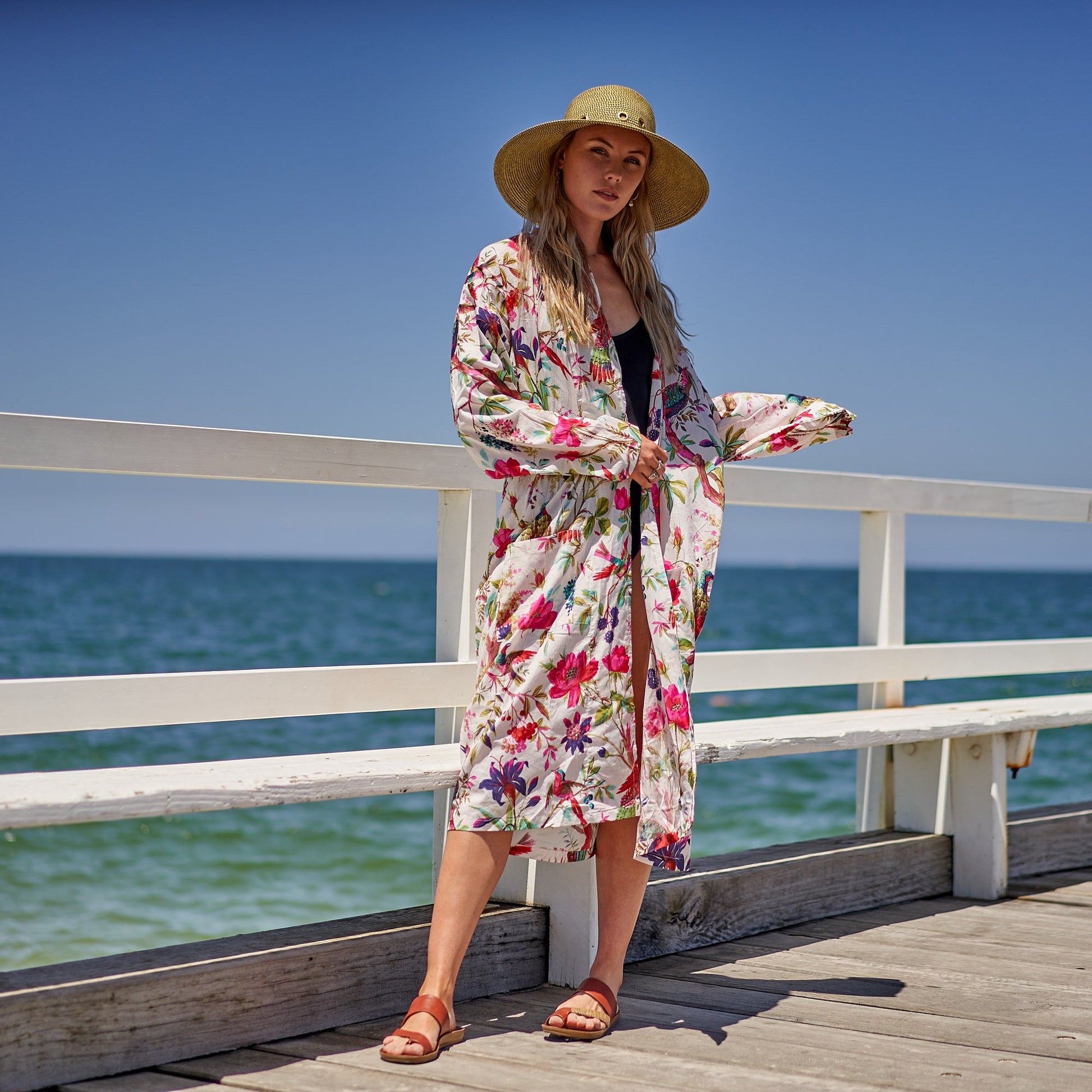 Bold floral-print kimono with flowing sleeves