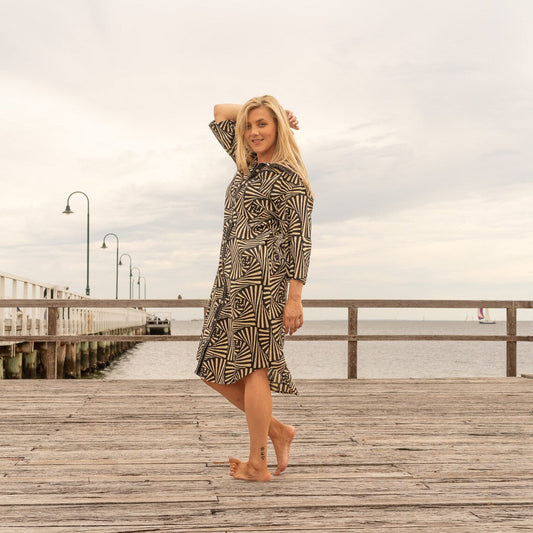 Black cotton long shirt dress with relaxed fit
