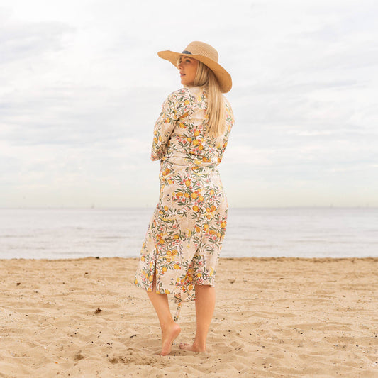 Woman walking in cotton kimono robe with floral print
