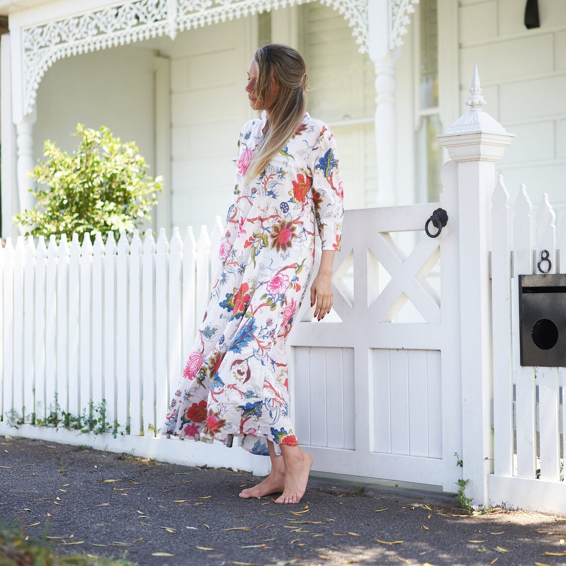 Stylish long kimono dress with elegant floral details
