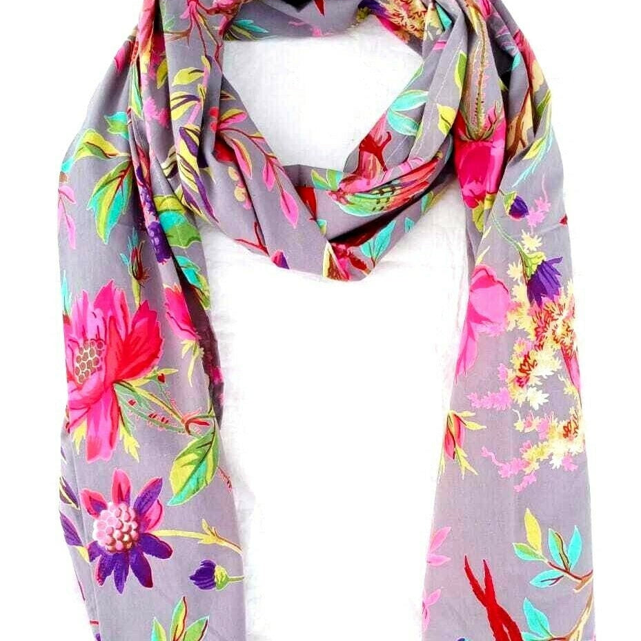Luxurious silk scarf featuring classic paisley print
