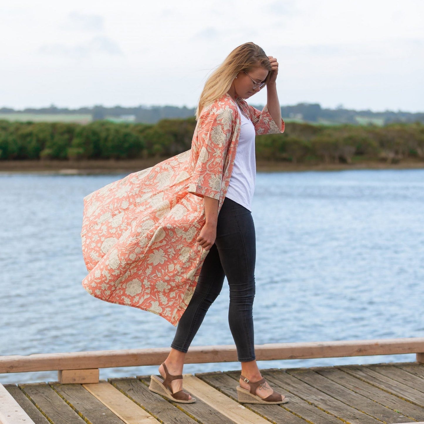 Elegant kimono-style robe with a subtle floral print
